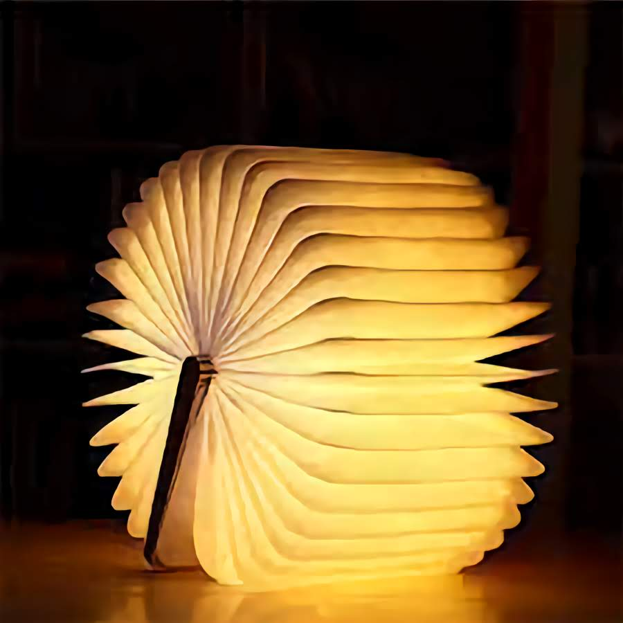 LED Wooden Book Lamp with a foldable design, emitting warm ambient light.